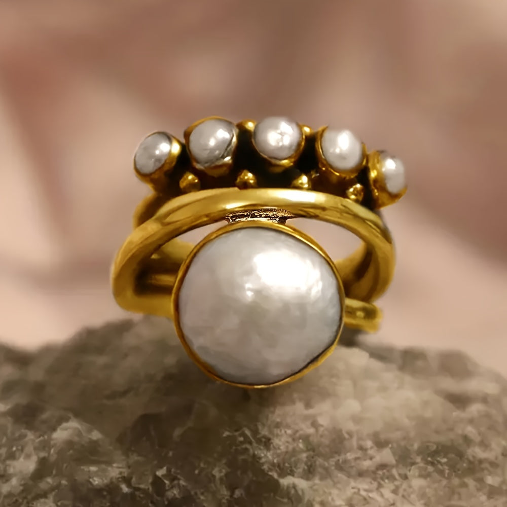 Vintage ring med konstpärla och lagerdesign