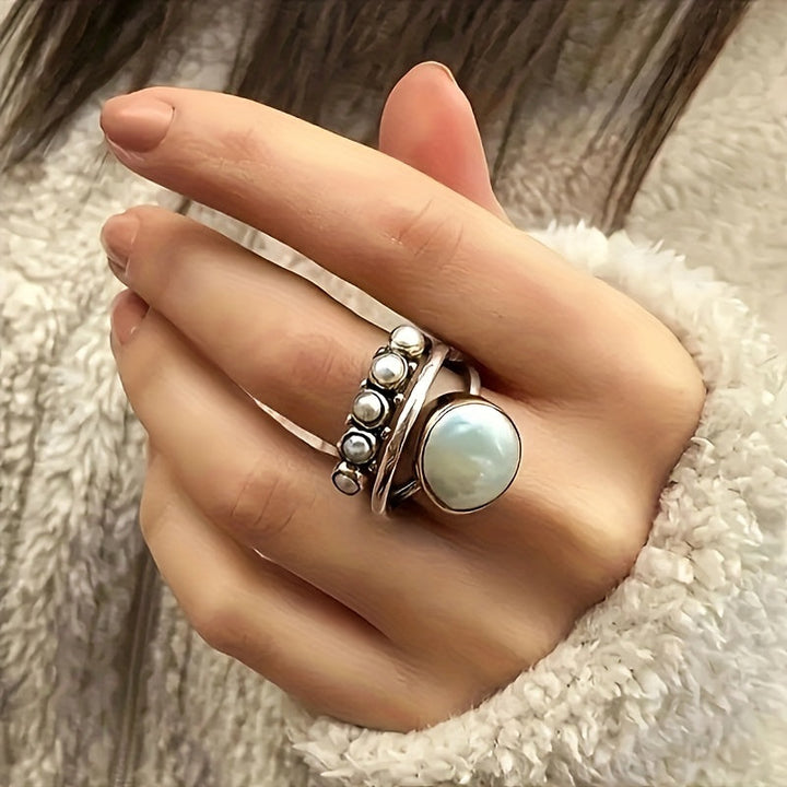 Vintage ring med konstpärla och lagerdesign