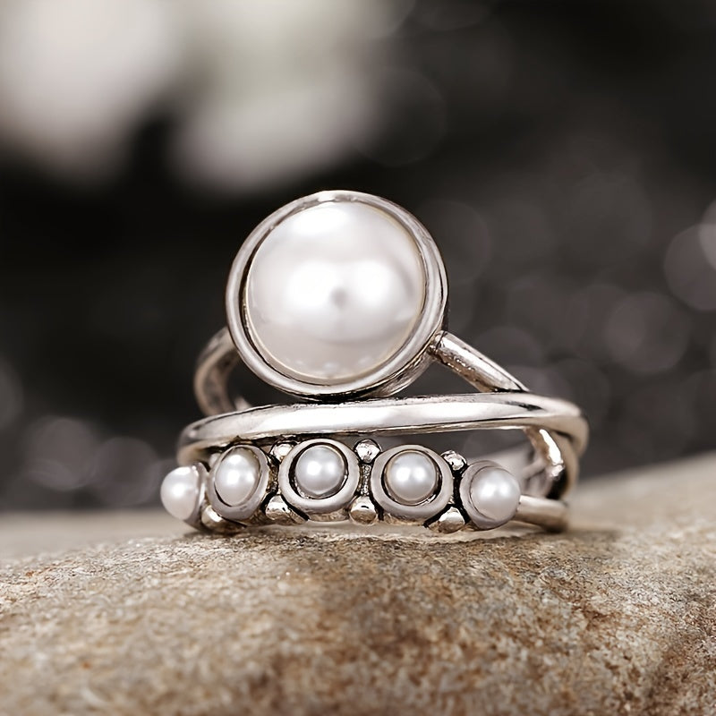 Vintage ring med konstpärla och lagerdesign